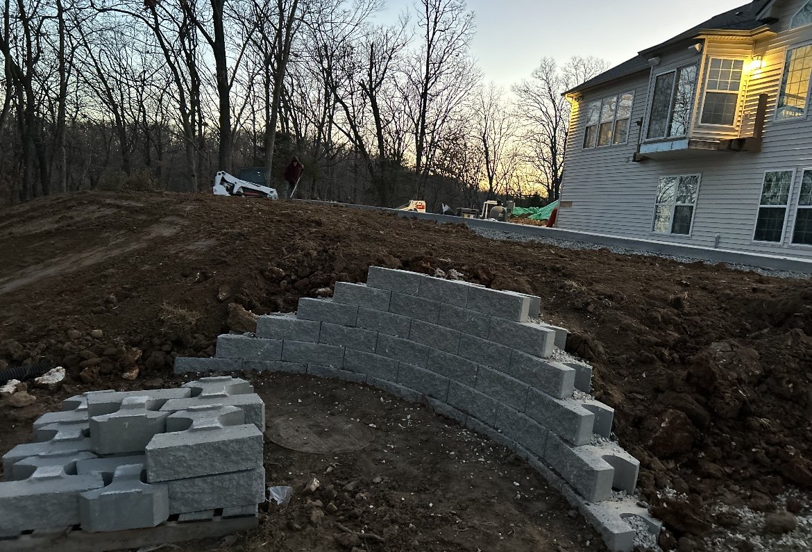 Hardscape retaining wall project by JLS Construction